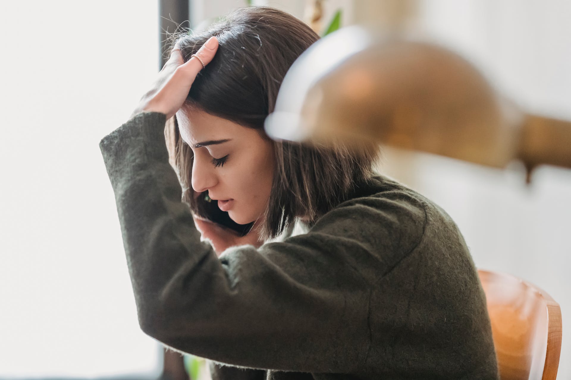 A woman speaking on the phone | Source: Pexels