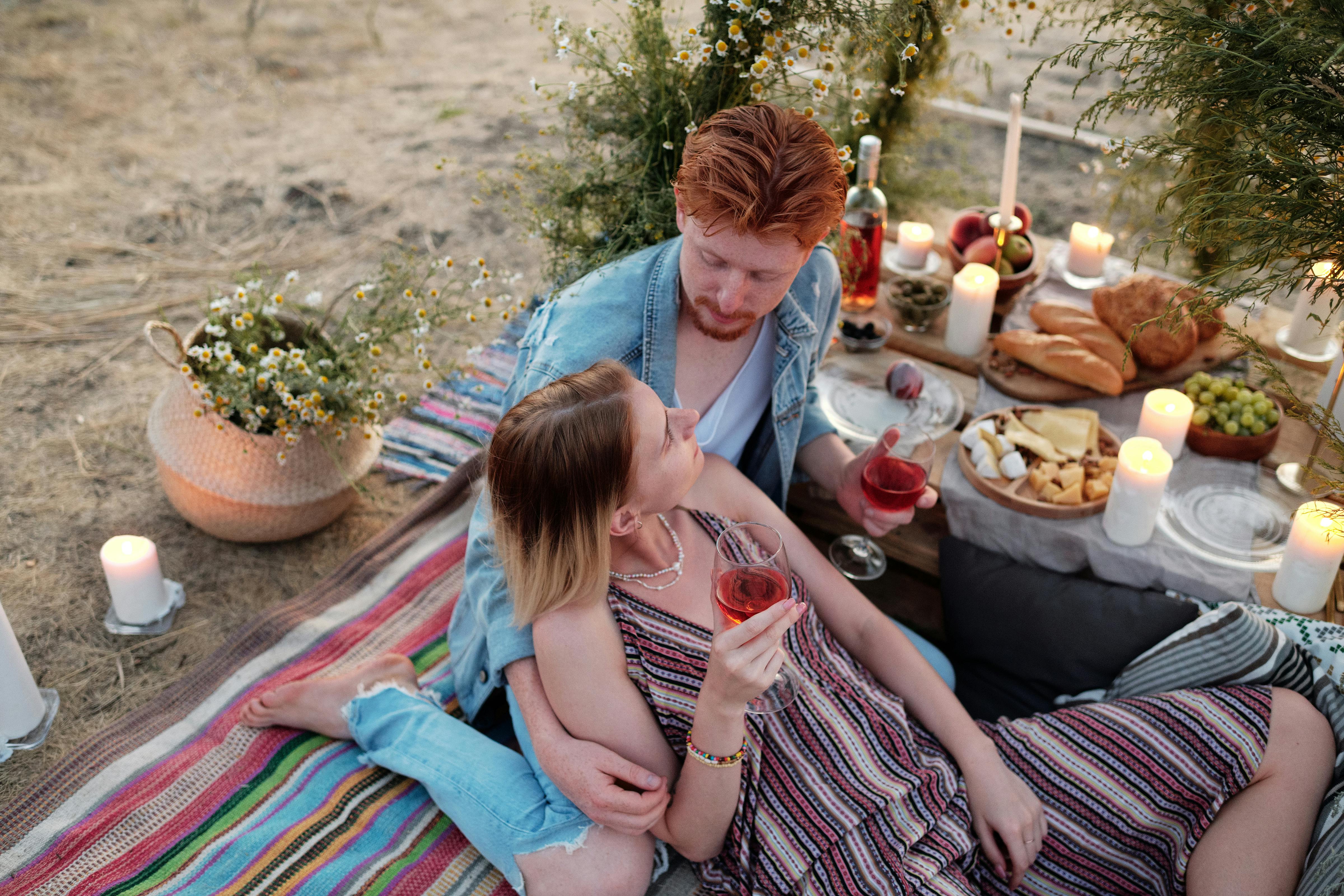 A couple bonding while enjoying a meal together | Source: Pexels