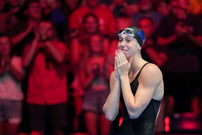 Gretchen Walsh reacts after setting a world record during the 100 butterfly semifinals June 15, 2024, during the U.S. Olympic Team Swimming Trials at Lucas Oil Stadium in Indianapolis.