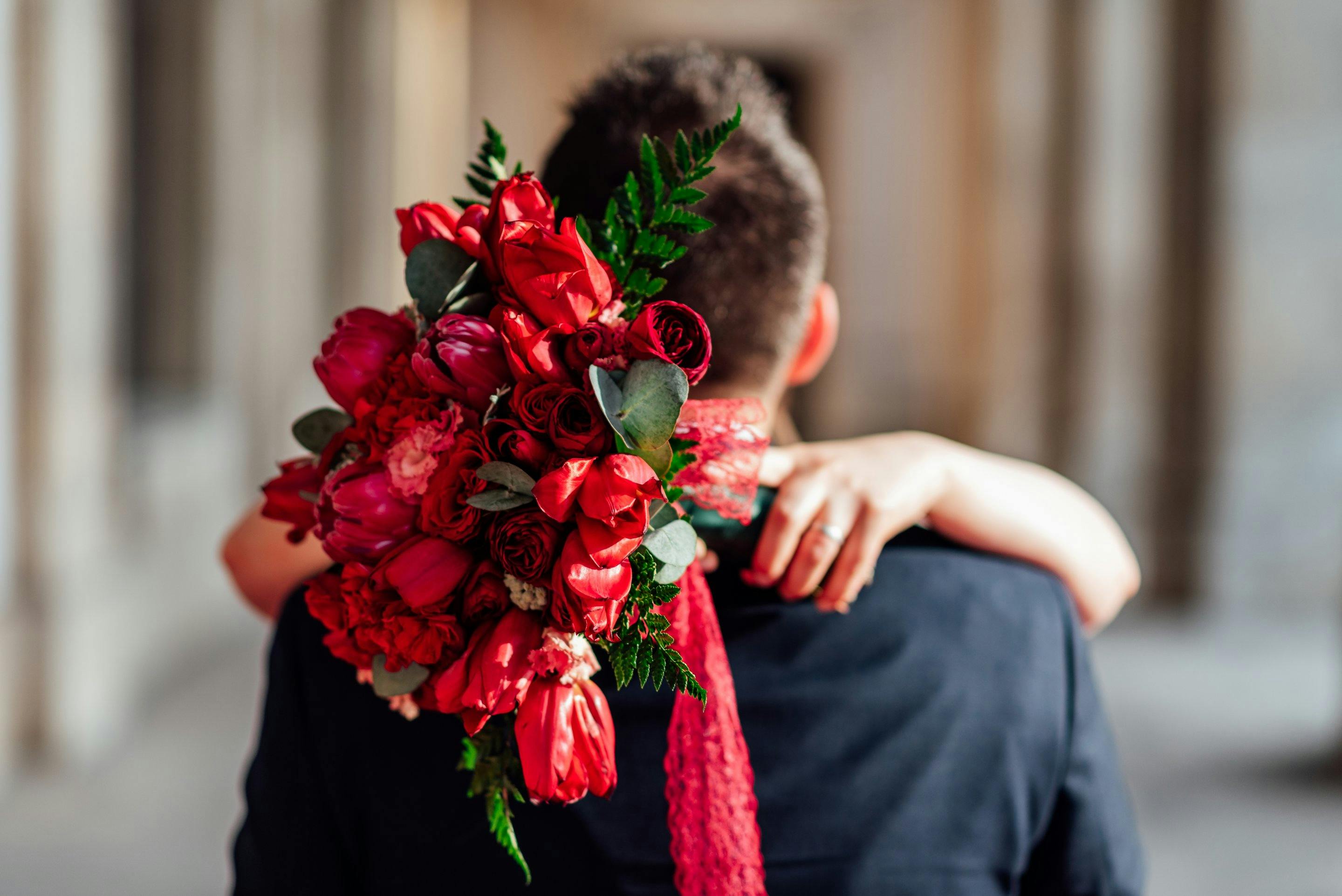 A woman hugging a man | Source: Pexels