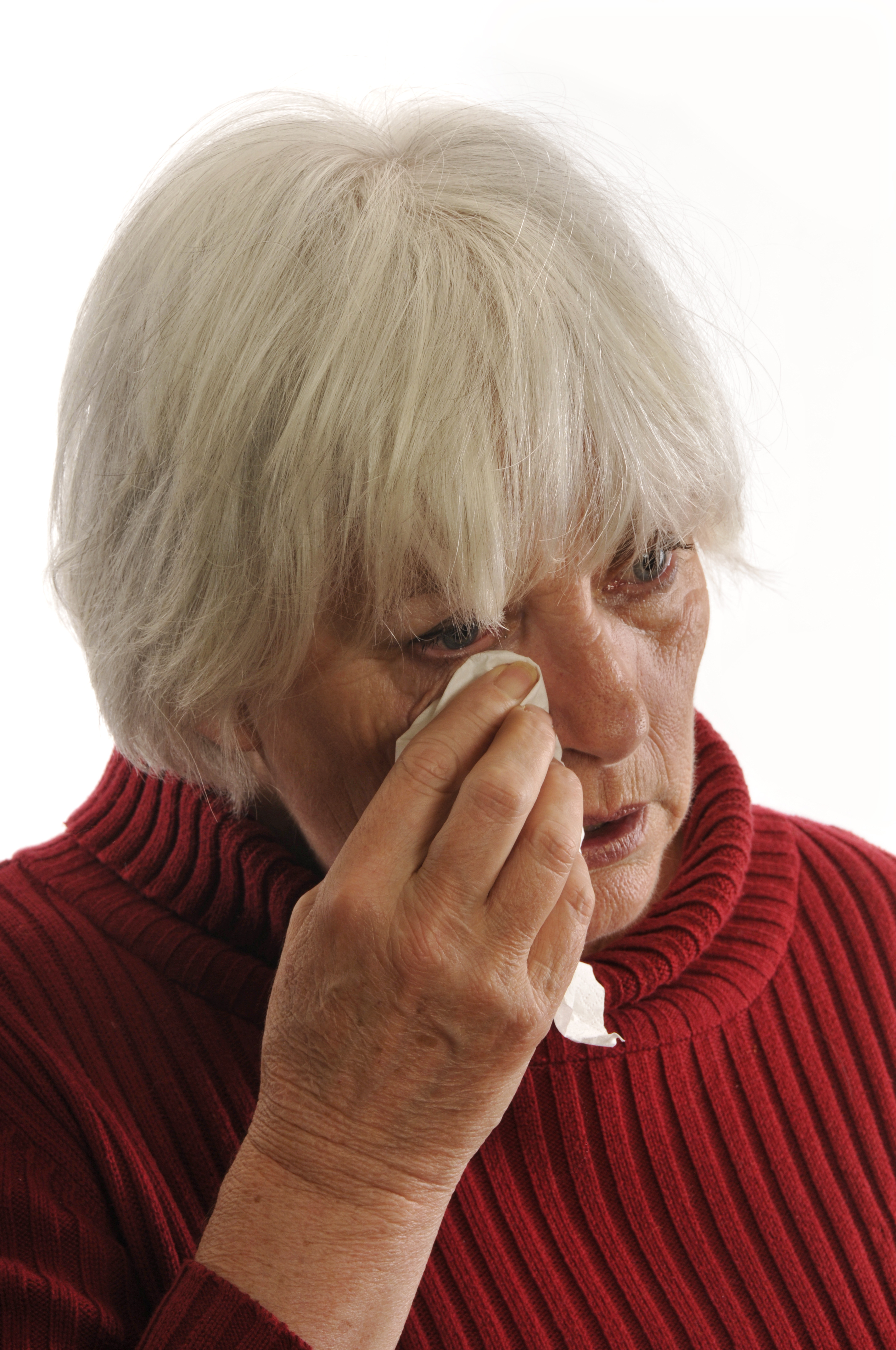 A sad woman wiping away tears | Source: Getty Images