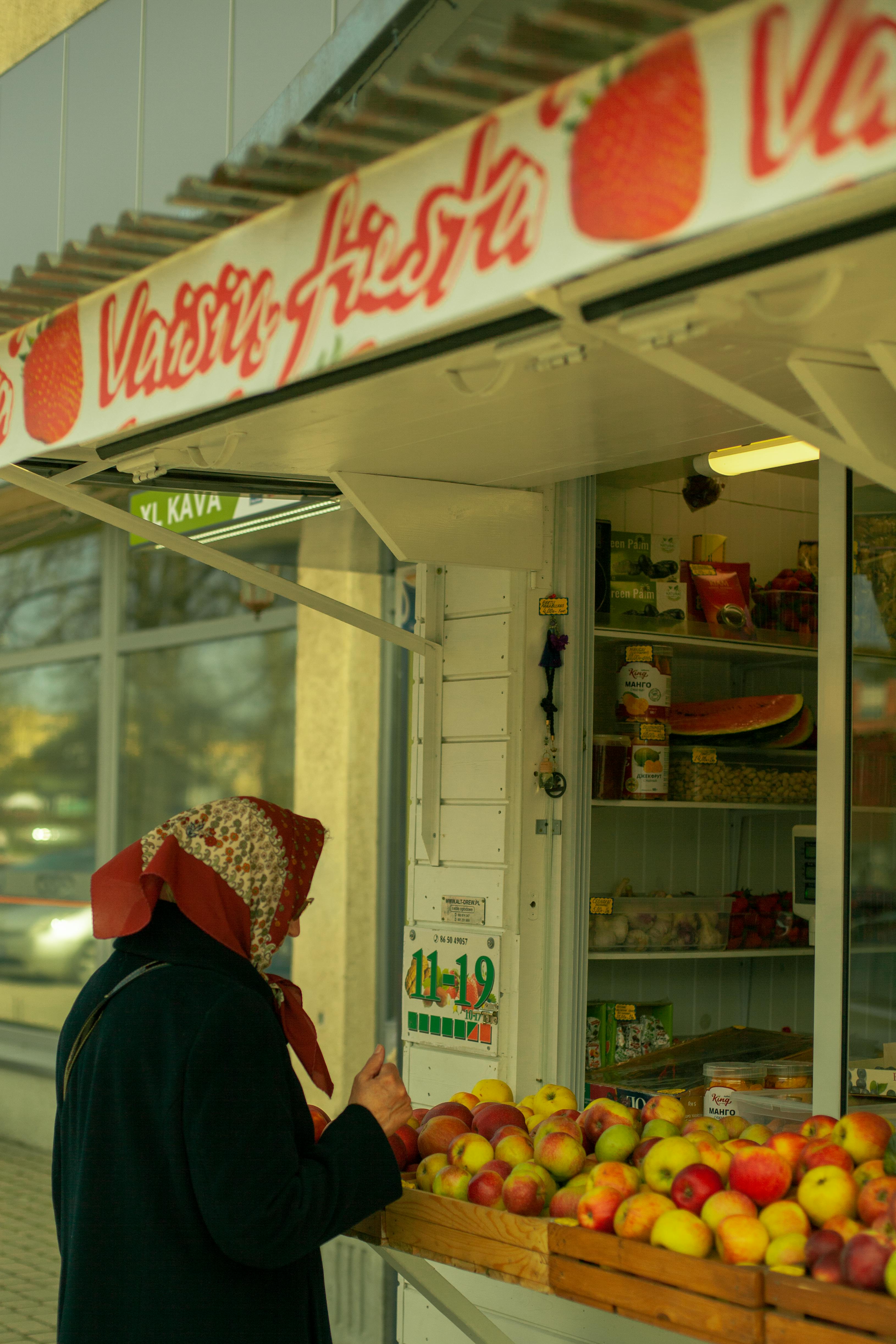 An elderly woman at a grocery store | Source: Pexels