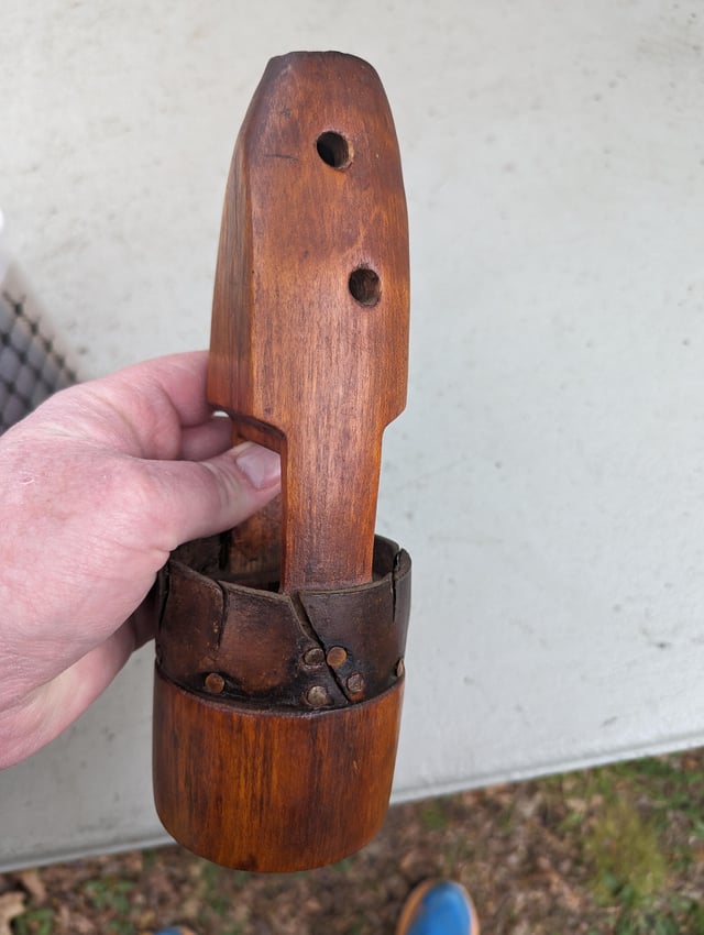 r/whatisthisthing - Wood and leather object left in our house when we bought it.