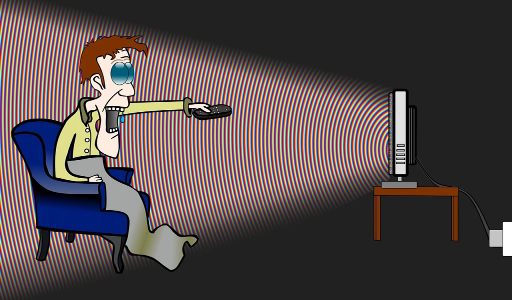 person laying hypnotized by the TV screen