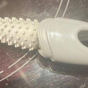 2-3 inches long white plastic, with bristle like ends which are pliable. Found in the bedroom drawer. Any ideas ?