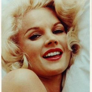 Her iconic role as a young, innocent girl with a provocative allure—lying in a baby crib, sucking her thumb—became a cinematic classic. Can you guess who she is?