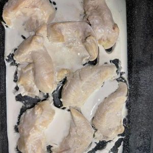 What is this white stuff that comes out of the chicken when I bake it? It’s NOT fat!