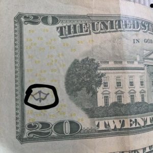 The Secret Marks on U.S. Dollar Bills: What Chop Marks Reveal About a Global Currency Journey