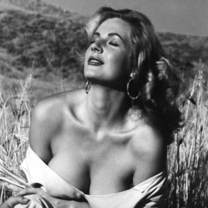 A timeless beauty with a presence that captivates the soul, she stepped into cinematic history with an unforgettable scene in La Dolce Vita. Can you guess who this iconic actress is? A timeless beauty with a presence that captivates the soul, she stepped into cinematic history with an unforgettable scene in La Dolce Vita. Can you guess who this iconic actress is?